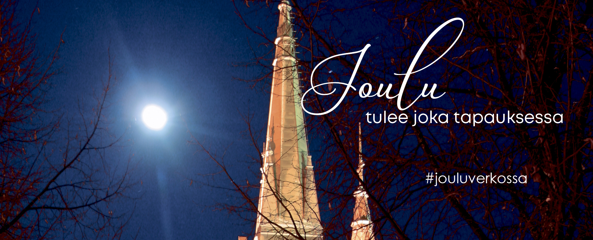 Öinen taivas, kuu ja kirkon torni, kuvatekstinä Joulu tulee joka tapauksessa